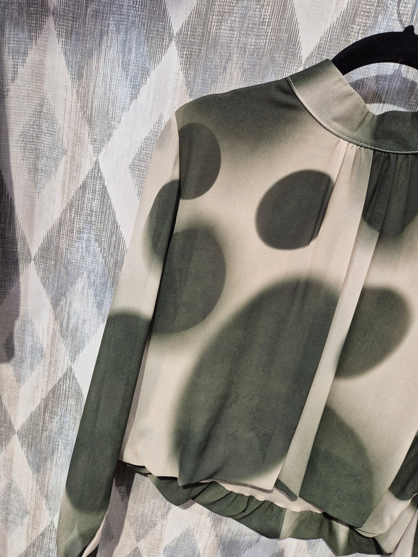 Blusa topos
