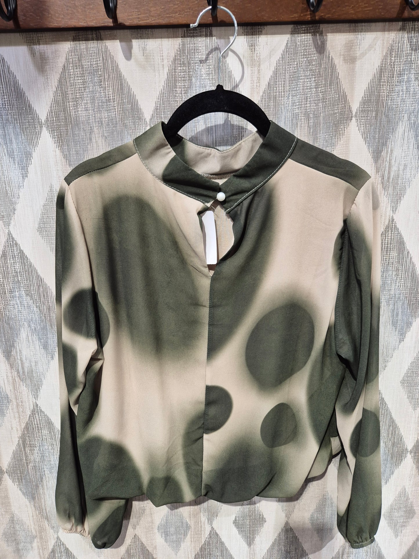 Blusa topos