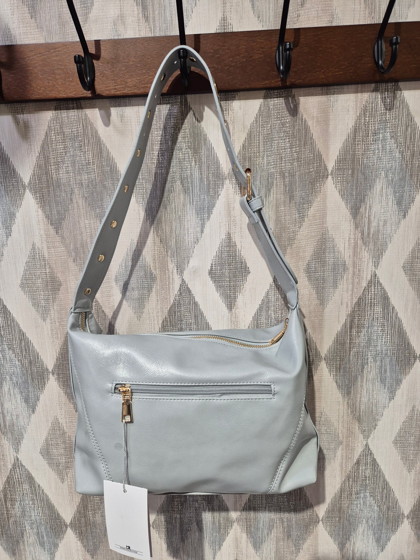Bolso tachas