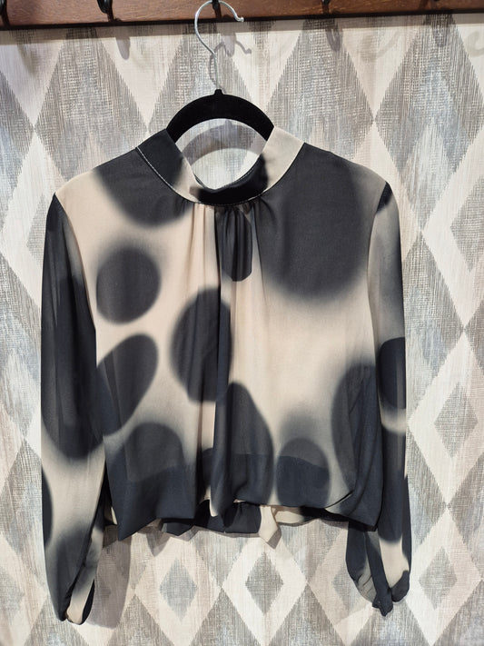 Blusa topos