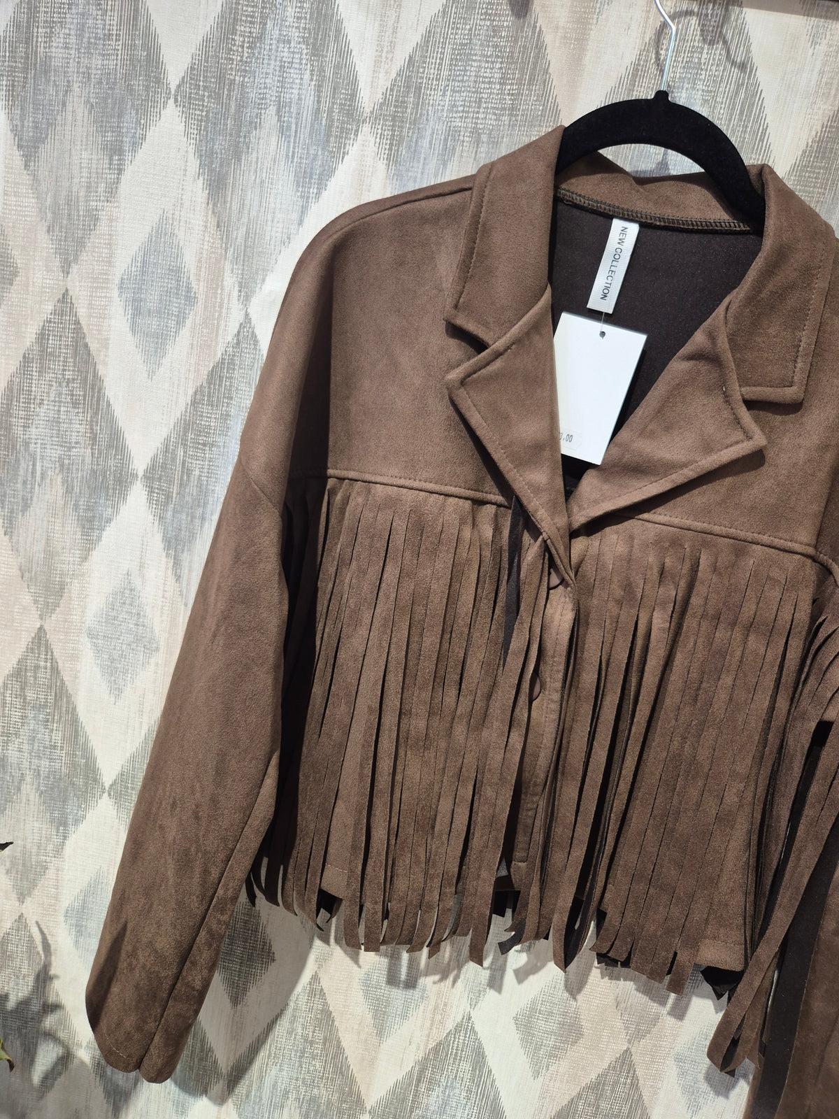 Chaqueta flecos